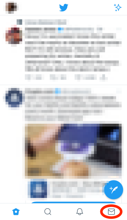 A blurred Twitter screenshot with the envelope icon indicating the inbox highlighted with a red oval. 